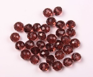 Cristale fatet.  grena transp 6X8 mm, gaura 1.5 mm, 70buc