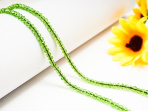 Cristale fatetate 3X2.5 mm, verde transparent 190 buc, gaura 0.6 mm